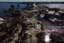 The destroyed road between Matlacha and Pine Island after Hurricane Ian caused widespread destruction in Matlacha, Florida, US, on October 2, 2022 [File: Marco Bello/ Reuters]