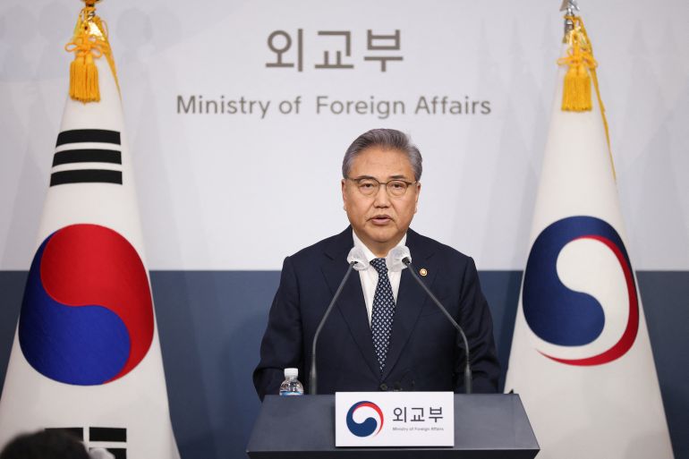 South Korean Foreign Minister Park Jin speaks at a lectern.