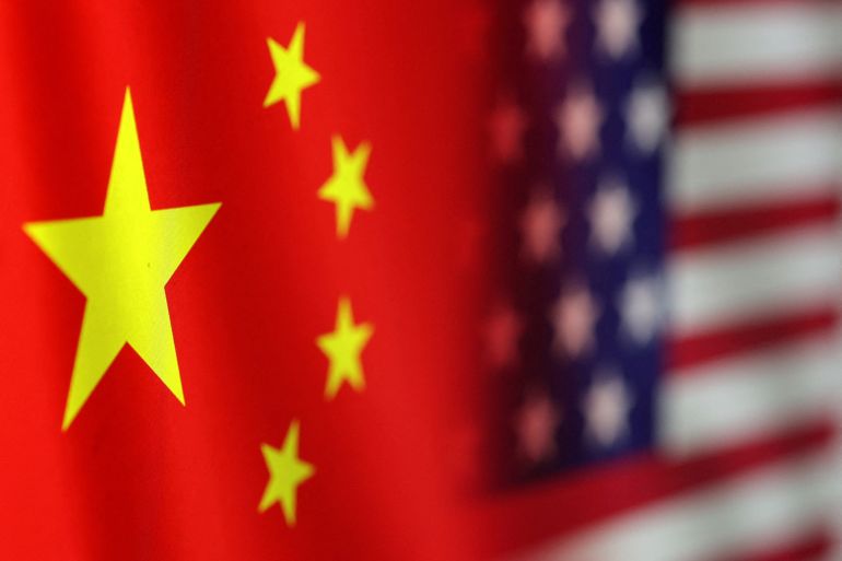 FILE PHOTO: U.S. and Chinese flags are seen in this illustration taken, January 30, 2023. REUTERS/Dado Ruvic/Illustration/File Photo