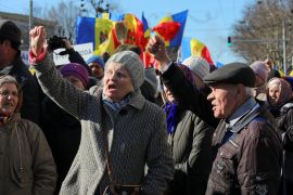 Participants protest against the recent countrywide increase of power rates and prices in Chisinau, Moldova