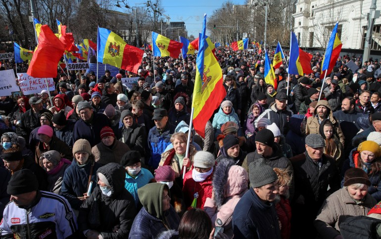 Participants protest the recent nationwide hike in electricity tariffs and prices at an anti-government rally organized by opposition political groups, including the Russia-friendly Shor Party, in Chisinau, Moldova, March 12, 2023. REUTERS/Vladislav Culiomza
