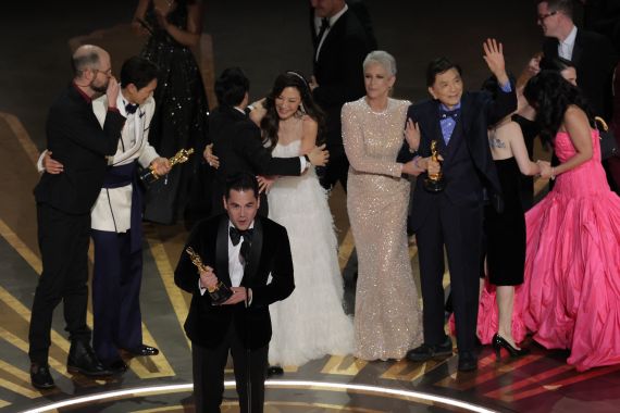 Daniel Kwan, Daniel Scheinert and Jonathan Wang win the Oscar for Best Picture for "Everything Everywhere All at Once" during the Oscars show at the 95th Academy Awards in Hollywood