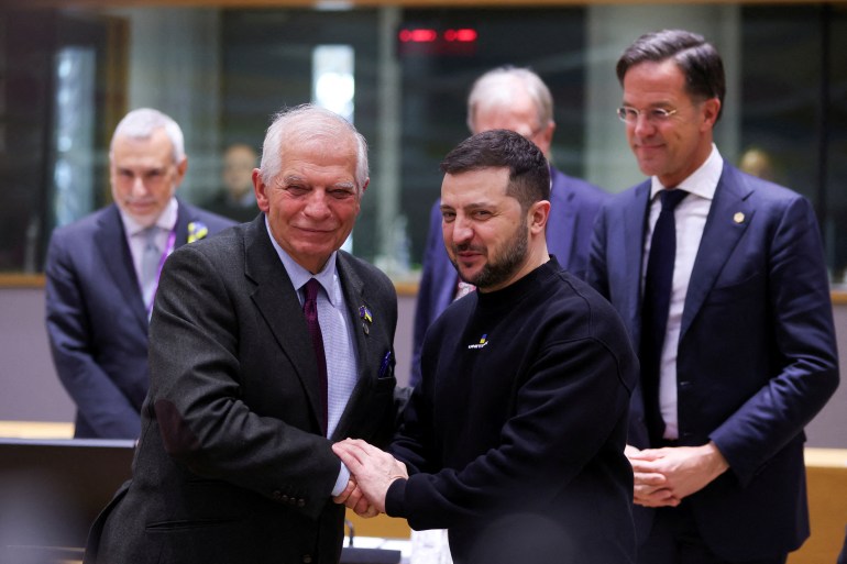 Ukrainian President Volodymyr Zelenskiy shakes hands with European Union foreign policy chief Josep Borrell