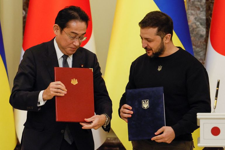 Ukraine's President Volodymyr Zelenskiy and Japanese Prime Minister Fumio Kishida