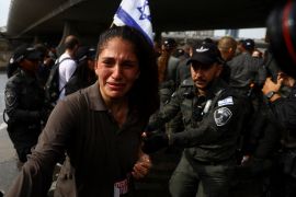 A demonstrator reacts during the "Day of Shutdown" protest in Israel