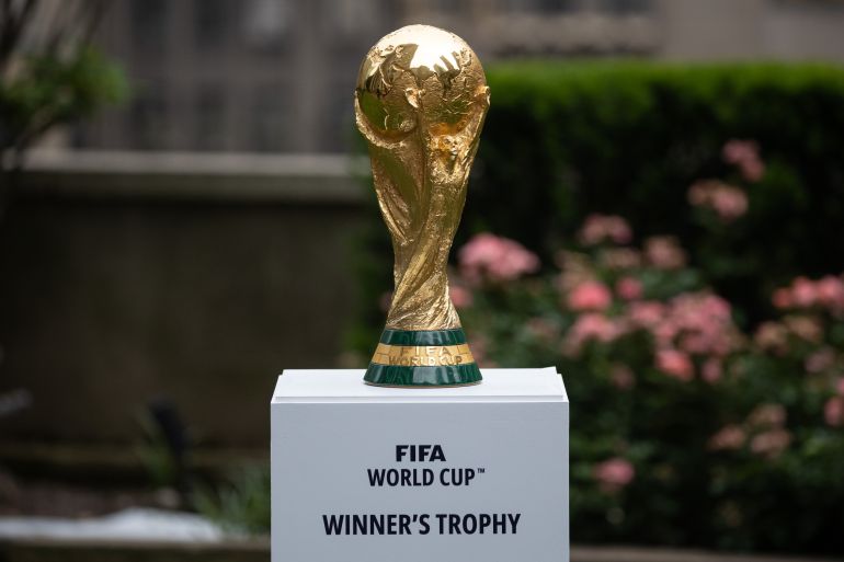 The FIFA World Cup trophy is displayed during an event in New York