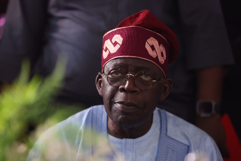Ruling party candidate Bola Tinubu, looks on in Abuja on March 1, 2023 during celebrations at his campaign headquarters