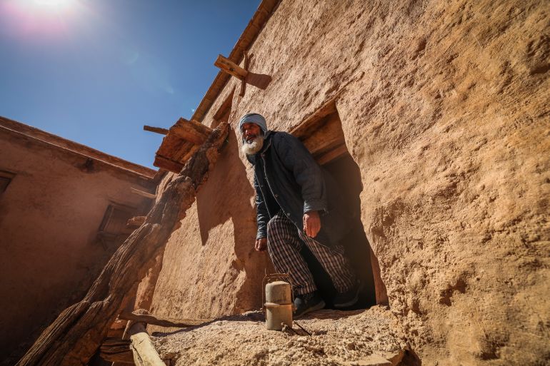 Guardian Lahcen Boutirane walks at the ancient collective granary of Ait Kine village in Morocco's region of Tata