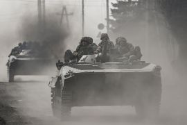 Ukrainian servicemen head toward Bakhmut in BMP infantry fighting vehicles, in eastern Ukraine [File: Aris Messinis/AFP]