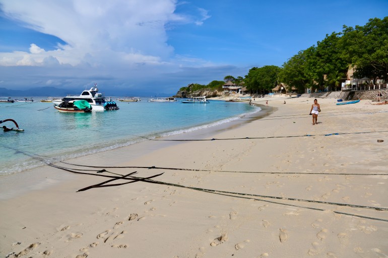 A Bali isle was plagued by trash. Residents made cleaning up pay | Business and Economy News