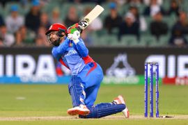 Afghanistan&#39;s Rashid Khan bats during a T20 World Cup cricket in Australia in 2022 [File: James Elsby/AP]