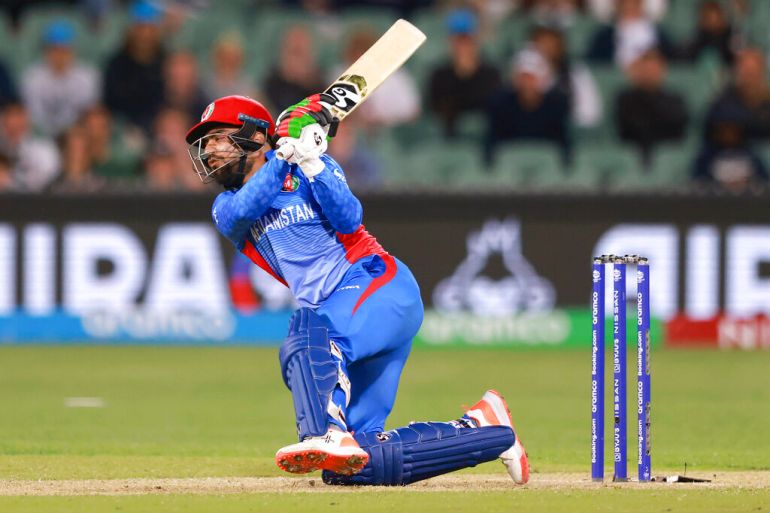 Afghanistan's Rashid Khan bats during the T20 World Cup cricket match between Australia and Afghanistan in Adelaide, Australia, Friday, Nov. 4, 2022. (AP Photo/James Elsby)