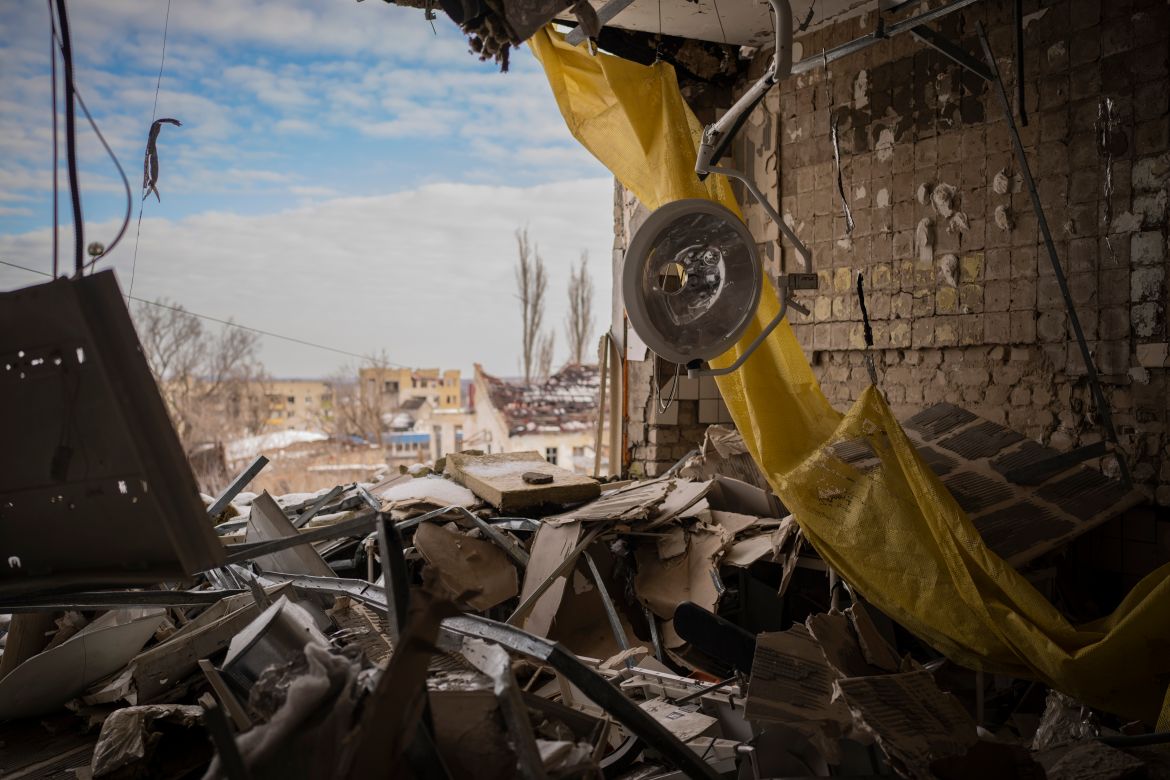 An operating light hangs from the ceiling of the destroyed surgery section of the hospital in Izium, Ukraine