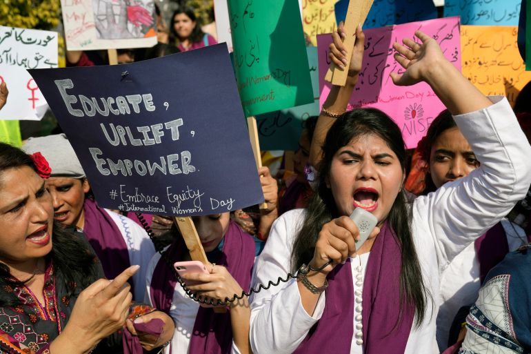 Activists take part in a rally to mark International Women's Day in Lahore.