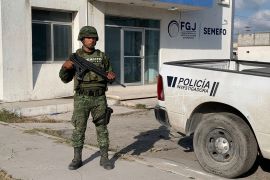 A Mexican soldier guards the Tamaulipas state prosecutor&#39;s headquarters in Matamoros in northern Mexico [File: AP]
