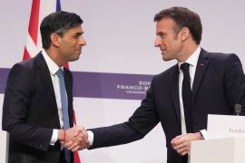 French President Emmanuel Macron, right, and Britain's Prime Minister Rishi Sunak