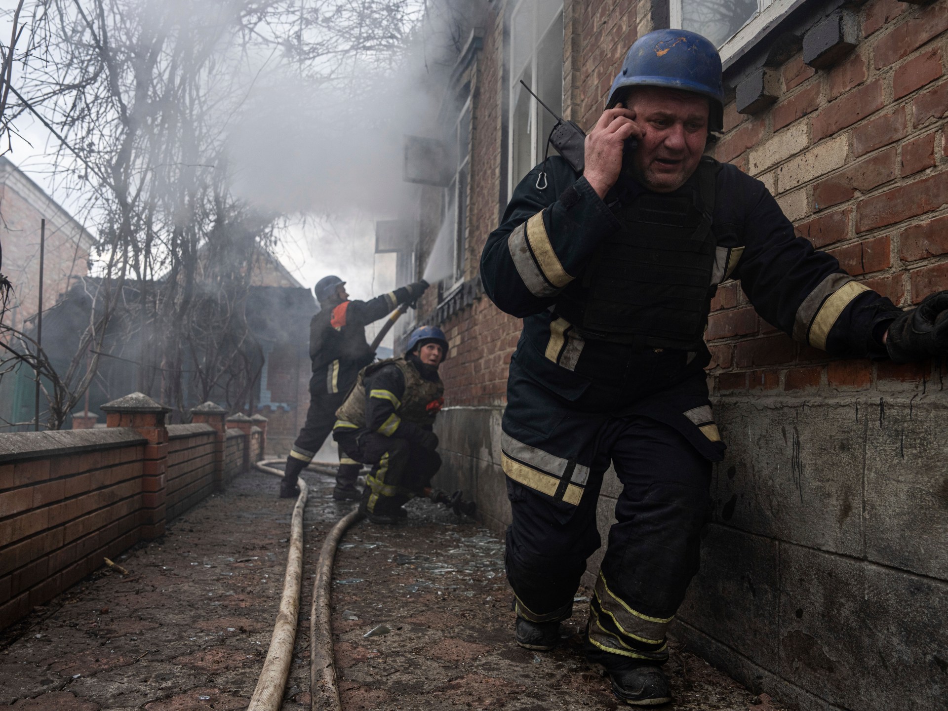 Photos: Ukrainian firefighters on risky mission to save lives