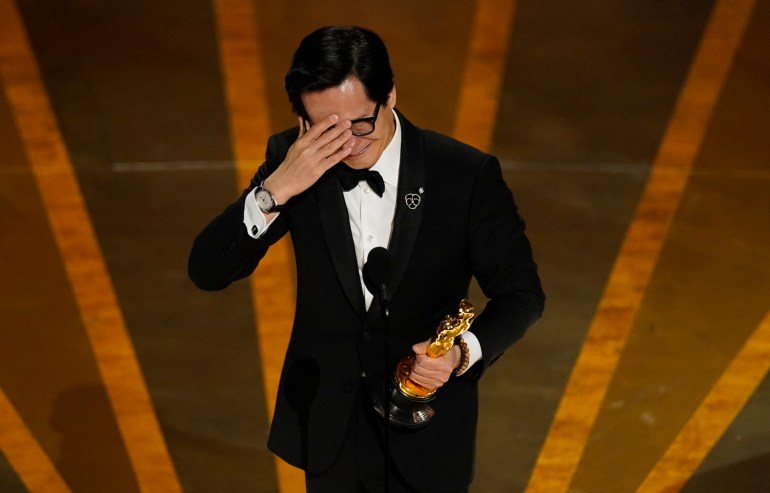 Ke Huy Quan tears up at the Oscars