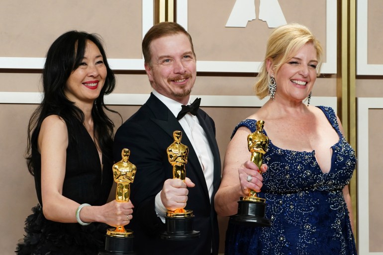 Three Oscar winners in a press room