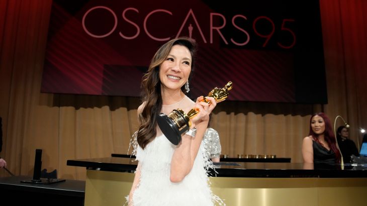 Michelle Yeoh holds her Oscar trophy