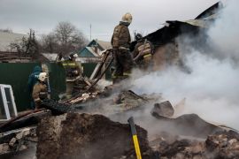 Firefighters extinguish a blaze after shelling that Russian officials in Donetsk said was conducted by Ukrainian forces [File: Alexei Alexandrov/AP]