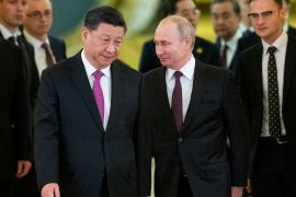FILE – Chinese President Xi Jinping, left, and Russian President Vladimir Putin enter a hall for talks in the Kremlin in Moscow, Russia, June 5, 2019. The Chinese government said Xi would visit Moscow from March 20, to March 22, 2023, but gave no indication when he departed. The Russian government said Xi was due to arrive at midday and meet later with Putin.(AP Photo/Alexander Zemlianichenko, Pool, File)