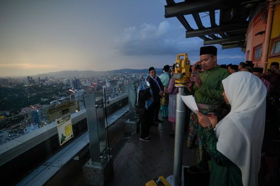 Members of the Malaysian Islamic authority perform "Rukyah Hilal Ramadan," the sighting of the new moon to determine the start of the holy fasting month of Ramadan in Kuala Lumpur, Malaysia