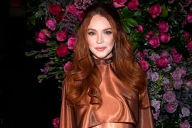 Lindsay Lohan and seven other celebrities have been charged with illegally promoting cryptocurrencies [File: Charles Sykes/AP]