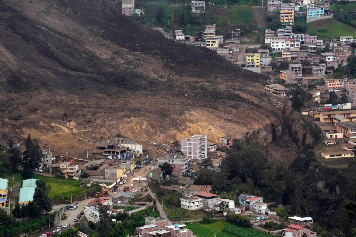 Some homes stand after a deadly landslide that buried dozens of homes in Alausi, Ecuador