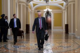 Senate Majority Leader Chuck Schumer enters the Capitol as the chamber weighs a repeal of two decades-old military force authorisations in Iraq [J Scott Applewhite/AP Photo]