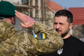 As the war enters its second year, Zelenskyy finds himself focused on keeping motivation high in both his military and the general population [Efrem Lukatsky/AP]