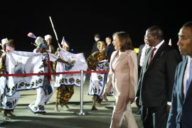 U.S. Vice President Kamala Harris, third right, welcomed by Tanzania's Vice President Philip Mpango, second right, on their arrival at Julius Nyerere International Airport in Dar es Salaam Wednesday, March 29, 2023 [Ericky Boniphace/AP]