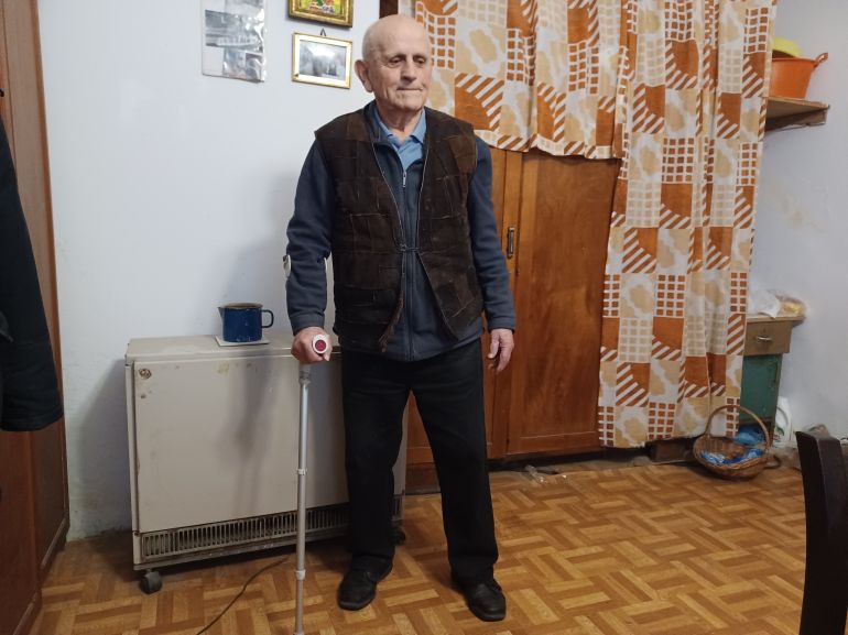 A photo of Ivan Capan standing ina room.