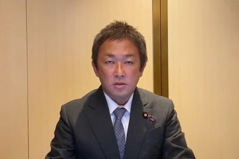 Japanese Youtuber and now expelled MP Yoshikazu Higashitani . He is wearing a sober suit in a screen grab from his TikTok channel.