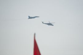 Myanmar military aircraft perform on Armed Forces Day in Myanmar&#39;s capital Naypyidaw in 2015. The US Treasury announced on March 24, 2023 that sanctions designed to cut the military regime&#39;s supplies of jet fuel had been imposed on companies and individuals [File: Ye Aung Thu/AFP]