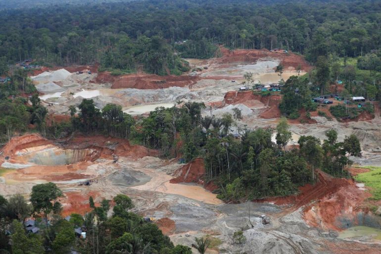An illegal gold mine in Colombia surrounded by deforestation