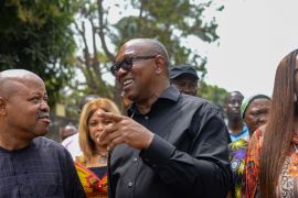 Labour Party presidential candidate Peter Obi chats with reporters after casting his vote during Nigeria's presidential election in his hometown in Agulu, Anambra state, Nigeria