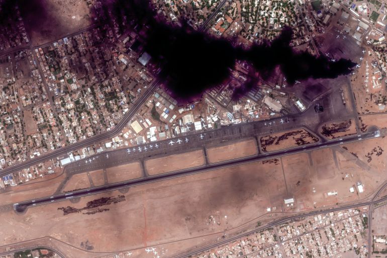 satellite image shows smoke over Khartoum International Airport