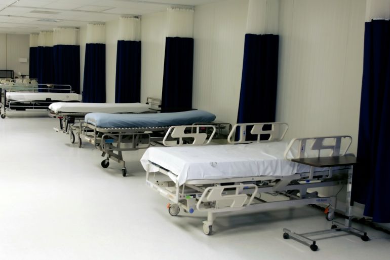 Hospital beds are seen at Camp Delta where some detainees have been tube-fed while participating in hunger strikes at the U.S. Naval Base Guantanamo Bay, Cuba in this January 18, 2006 file photo. [The United Nations ]committee against torture told the United States on May 19, 2006 it should close any secret prisons abroad and the Guantanamo Bay facility in Cuba, saying they violated international law.