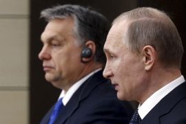 Russian President Vladimir Putin (R) and Hungarian Prime Minister Viktor Orban