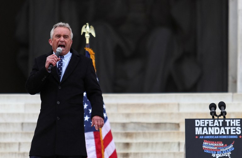 Robert F. Kennedy Jr. speaks during a rally following a march in opposition to coronavirus disease (COVID-19) mandates on the National Mall