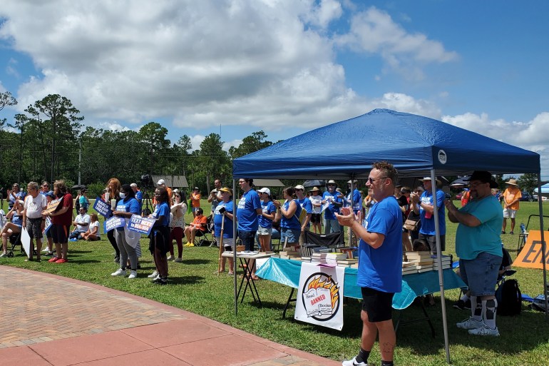 A stand where books banned in libraries are available for free in a Florida park in 2022