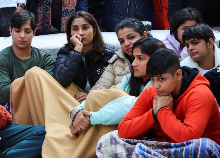 Vinesh Phogat, Sakshi Malik and other Indian wrestlers take part in a protest demanding the disbandment of the WFI and the investigation of its head by the police, who they accuse of sexually harassing female players, at Jantar Mantar in New Delhi, India