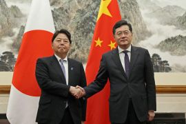 Japanese Foreign Minister Yoshimasa Hayashi, left, meets Chinese Foreign Minister Qin Gang in Beijing [Kyodo/via Reuters]