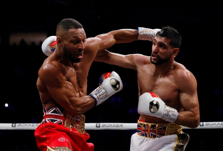 FILE PHOTO: Boxing - Amir Khan v Kell Brook - AO Arena, Manchester, Britain - February 19, 2022 Amir Khan in action against Kell Brook Action Images via Reuters/Andrew Couldridge