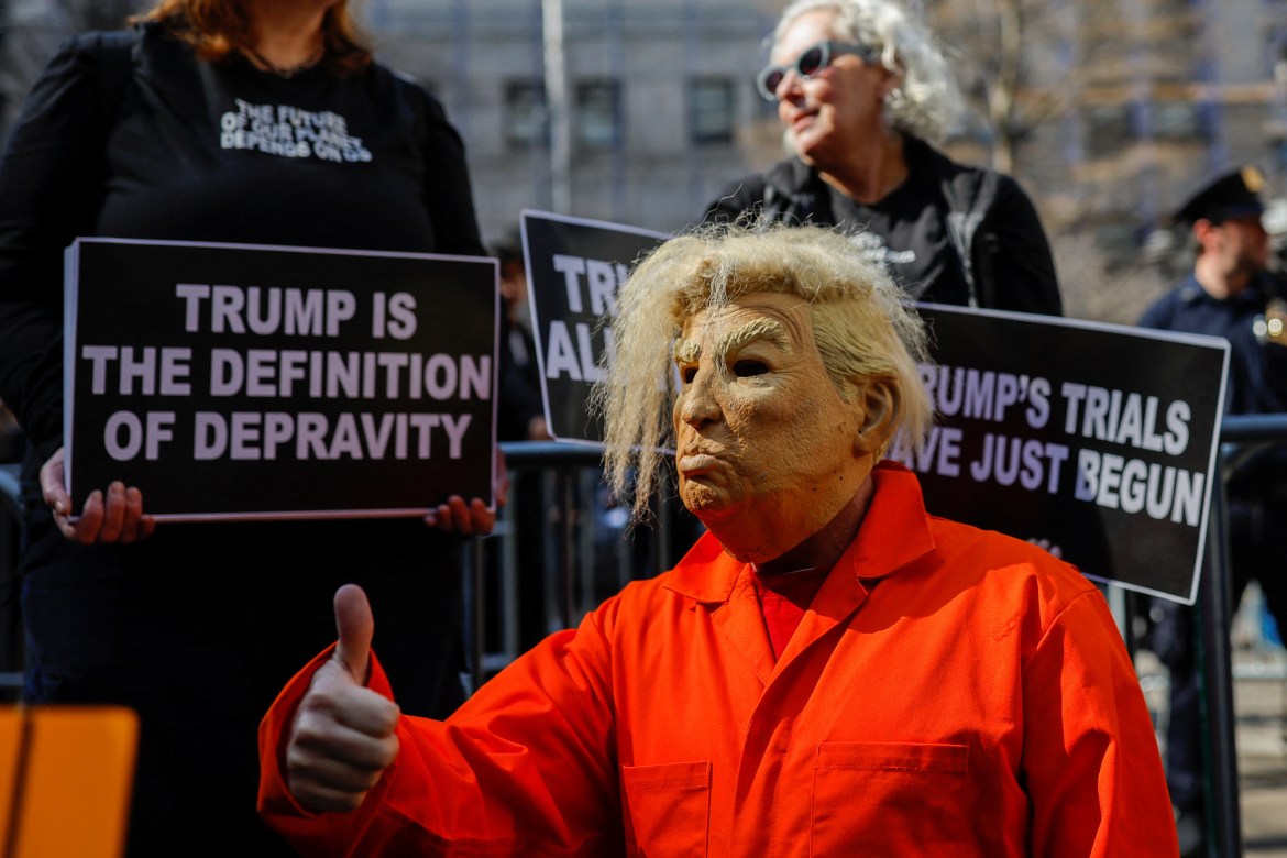 Anti-Trump protesters demonstrate ahead of his arraignment hearing