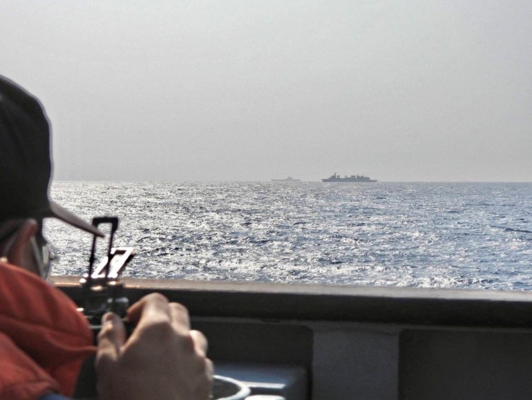 The Shandong as seen from a Taiwan navy ship. It is far in the distance.