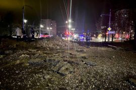 A view shows the accident scene following a large blast in a street in the city of Belgorod, Russia