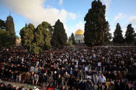 Palestinians attend Eid al-Fitr prayers at the compound that houses Al-Aqsa mosque, known to Muslims as Noble Sanctuary and to Jews as Temple Mount, in Jerusalem's Old City, April 21, 2023. REUTERS/Jamal Awad NO RESALES. NO ARCHIVES
