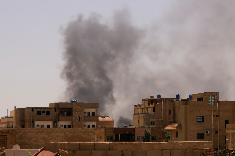 Smoke is seen rise from buildings during clashes between the paramilitary Rapid Support Forces and the army in Khartoum North, Sudan